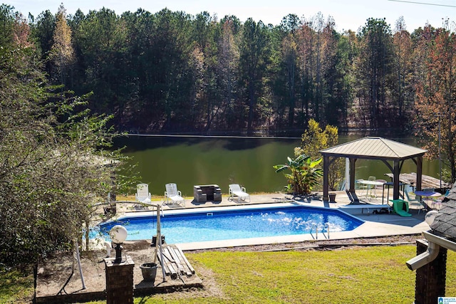 view of pool featuring a gazebo, a yard, a water view, and a patio area