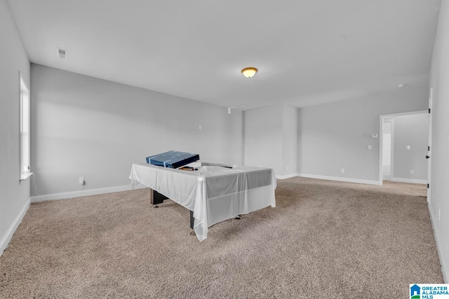 carpeted bedroom featuring billiards