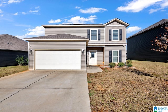 front facade featuring a garage and a front yard