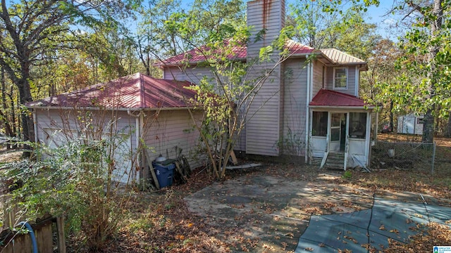 rear view of property with a patio