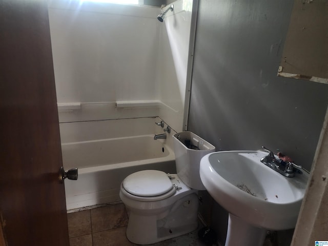 bathroom featuring tile patterned floors, sink, and toilet