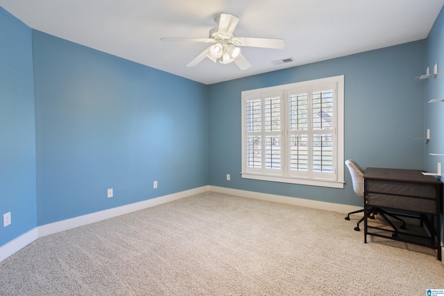 home office featuring carpet flooring and ceiling fan