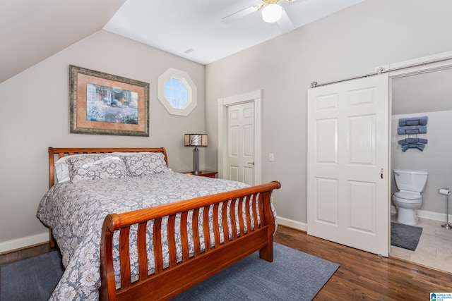 1001 Kingsway Dr, Anniston, AL 36207 - bedroom with wood finished floors, lofted ceiling, ceiling fan, connected bathroom, and baseboards