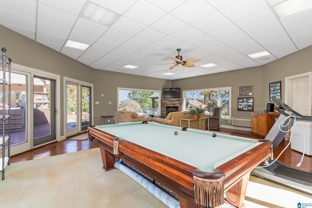 1001 Kingsway Dr, Anniston, AL 36207 - playroom with a drop ceiling, ceiling fan, pool table, plenty of natural light, and a stone fireplace