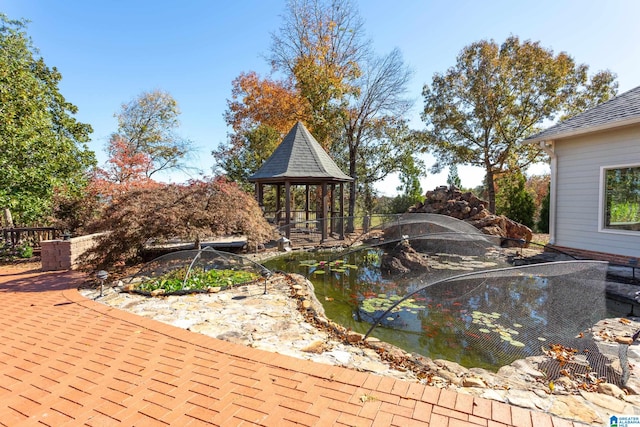 view of swimming pool with a gazebo