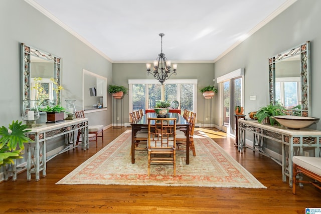 1001 Kingsway Dr, Anniston, AL 36207 - dining space with a chandelier, wood finished floors, ornamental molding, and baseboards