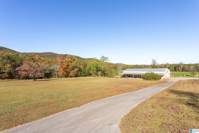 exterior space featuring a mountain view