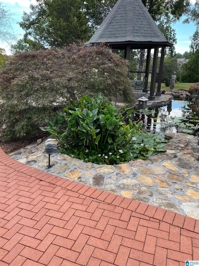 view of patio featuring a gazebo