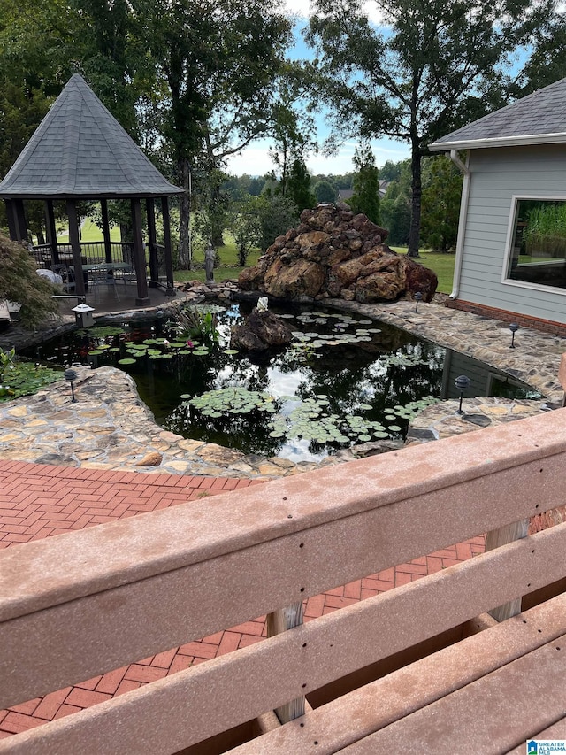 1001 Kingsway Dr, Anniston, AL 36207 - view of yard featuring a garden pond and a gazebo