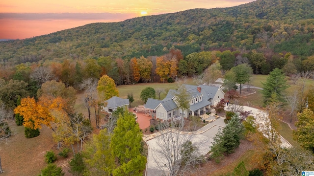 aerial view at dusk with a mountain view