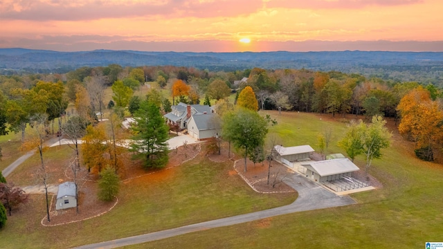 aerial view at dusk with a mountain view