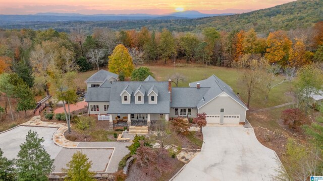 1001 Kingsway Dr, Anniston, AL 36207 - view from above of property featuring a heavily wooded area and a mountain backdrop