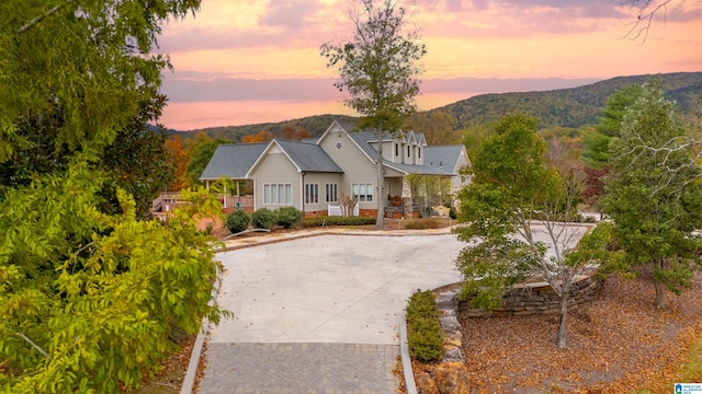 view of front of property with a mountain view