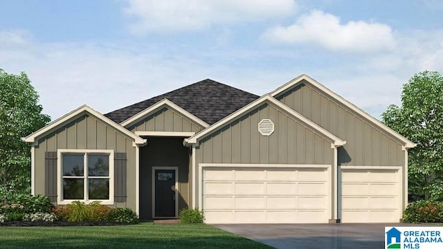 view of front of property with a front lawn and a garage