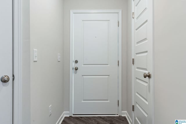 doorway to outside with dark hardwood / wood-style floors