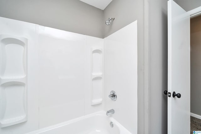 bathroom with shower / bathtub combination