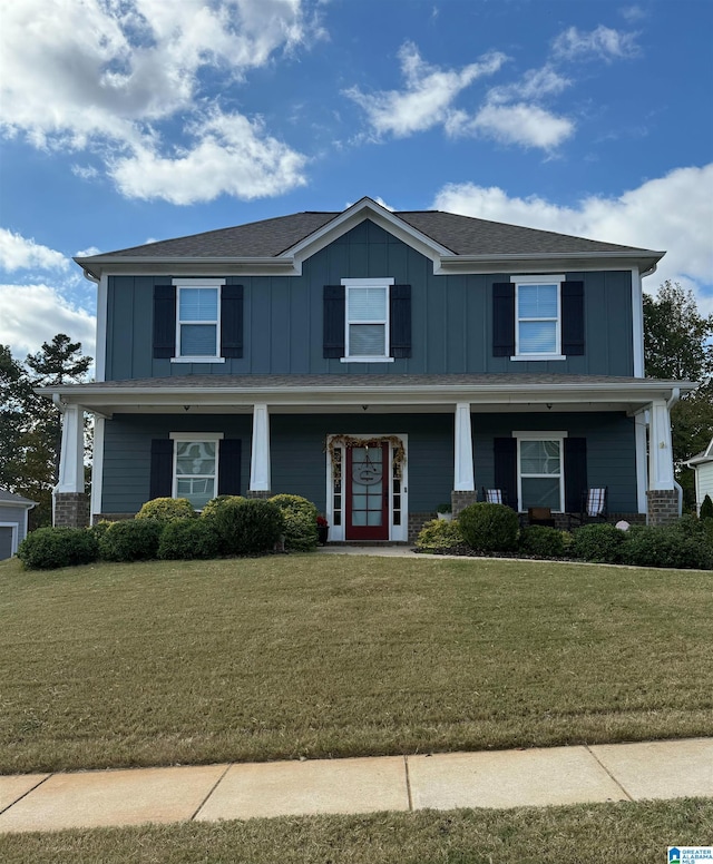 craftsman house with a front yard