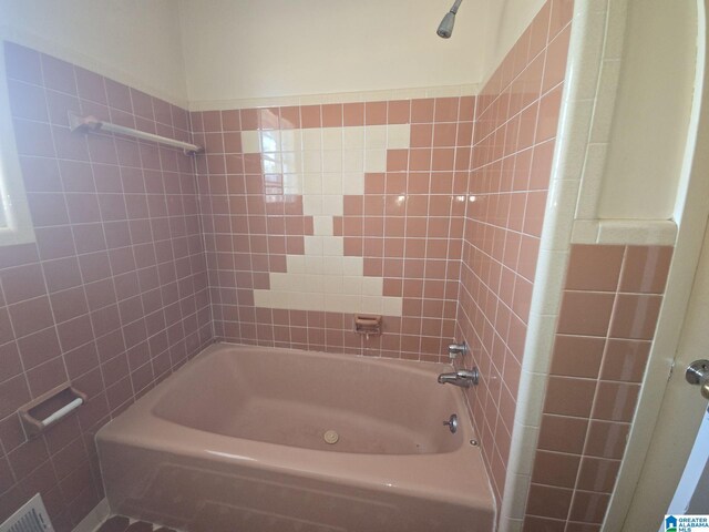 full bath with shower / bath combination and visible vents