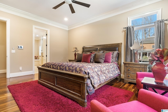 bedroom with dark hardwood / wood-style floors, ceiling fan, ornamental molding, and ensuite bath