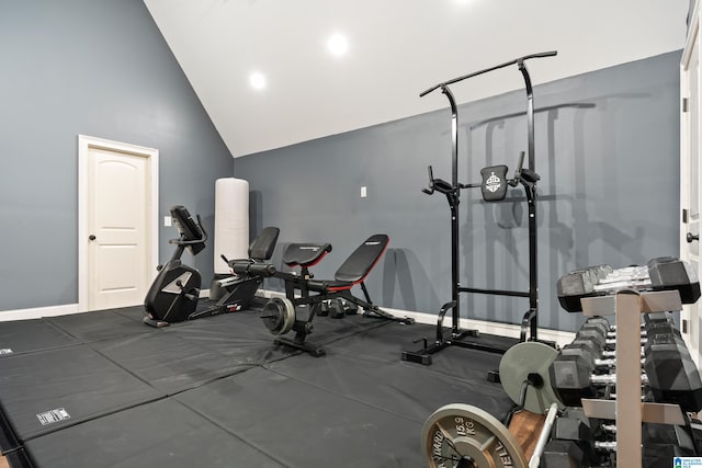 exercise area featuring vaulted ceiling