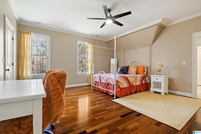 bedroom with ceiling fan, dark hardwood / wood-style floors, and ornamental molding