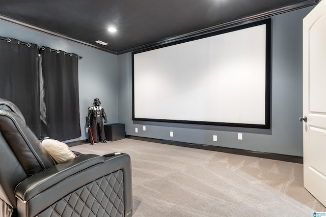 cinema room with light carpet and ornamental molding