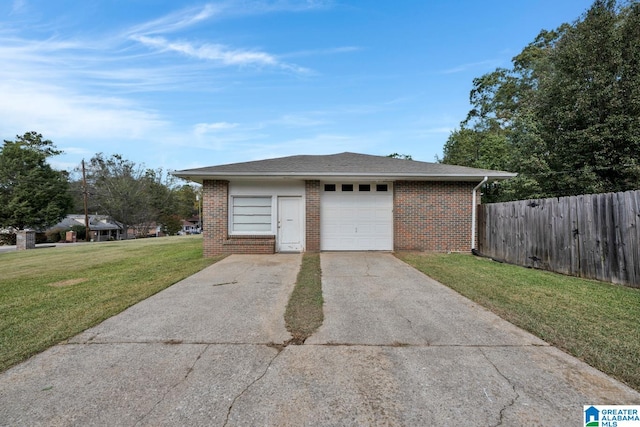 garage featuring a yard