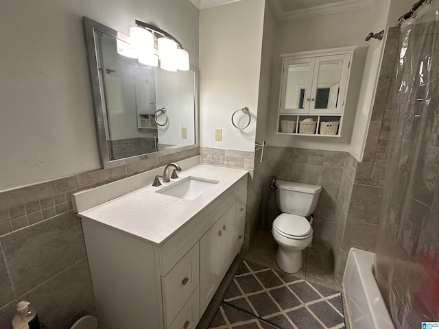 full bathroom with vanity, shower / bath combination with curtain, crown molding, toilet, and tile walls