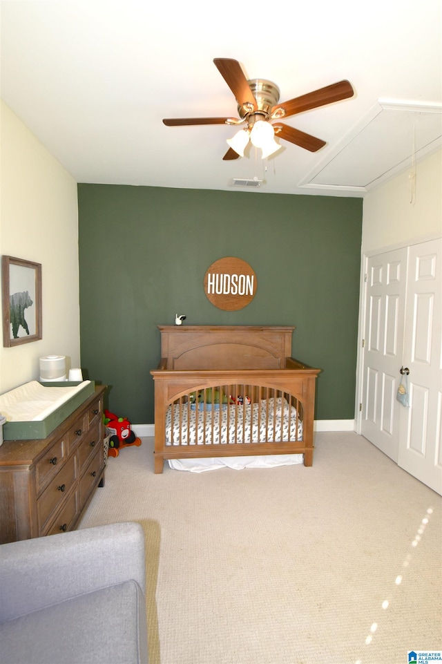 carpeted bedroom featuring ceiling fan