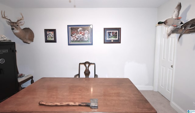 view of carpeted dining space