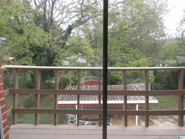 825 Goldwire St SW, Birmingham, AL 35211 - wooden terrace with a shed and an outbuilding