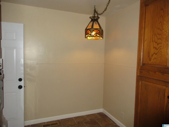 825 Goldwire St SW, Birmingham, AL 35211 - unfurnished dining area with baseboards