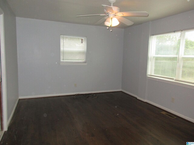 825 Goldwire St SW, Birmingham, AL 35211 - spare room with wood finished floors, baseboards, and ceiling fan