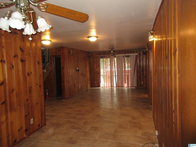 825 Goldwire St SW, Birmingham, AL 35211 - spare room with a chandelier and wooden walls