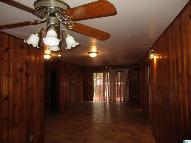 825 Goldwire St SW, Birmingham, AL 35211 - empty room with wooden walls and a ceiling fan