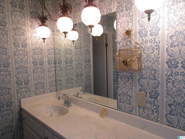 825 Goldwire St SW, Birmingham, AL 35211 - bathroom with wallpapered walls and vanity