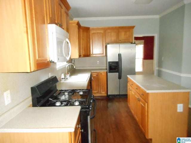 kitchen featuring sink, dark wood-type flooring, stainless steel fridge, black range with gas cooktop, and ornamental molding