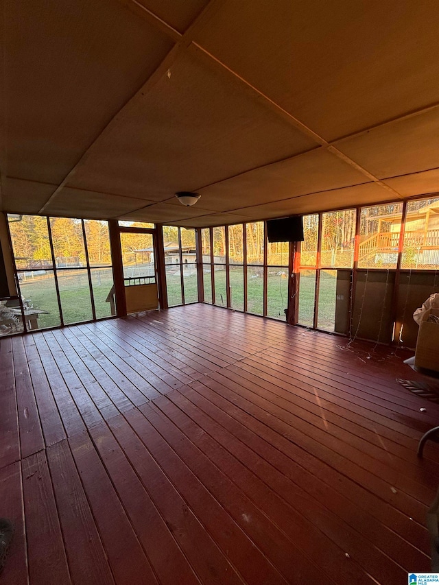 unfurnished sunroom with a wealth of natural light