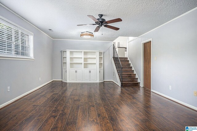 unfurnished living room featuring crown molding, a textured ceiling, ceiling fan, and dark hardwood / wood-style flooring