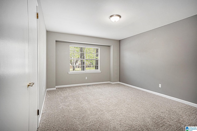 view of carpeted spare room