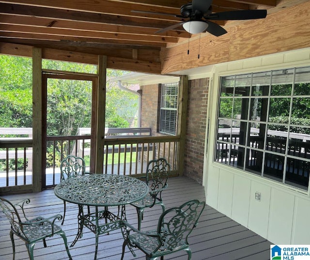 sunroom / solarium with ceiling fan