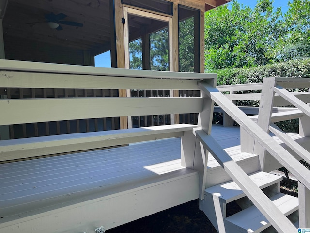 exterior space featuring ceiling fan