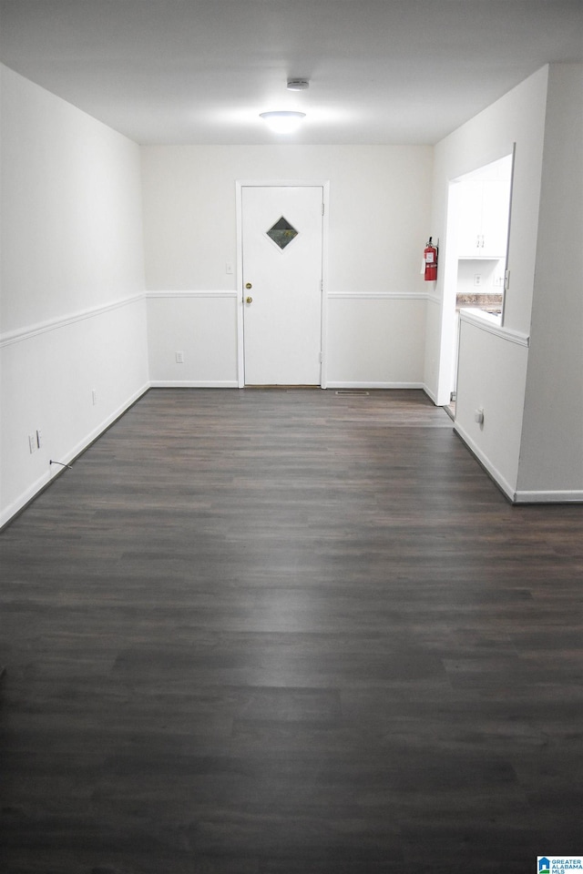 interior space featuring dark wood-type flooring