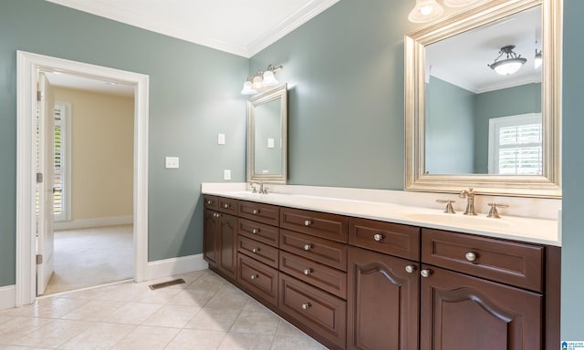 bathroom featuring tile patterned floors, vanity, and ornamental molding