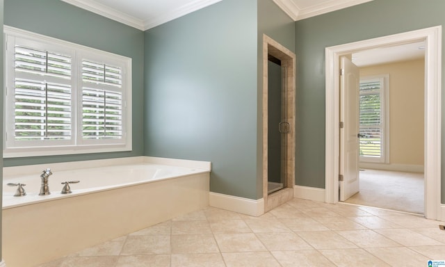 bathroom with separate shower and tub, tile patterned floors, and ornamental molding