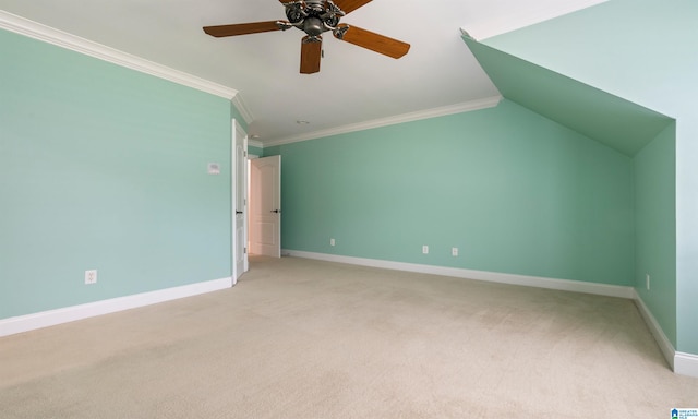 additional living space featuring ceiling fan, light colored carpet, and lofted ceiling