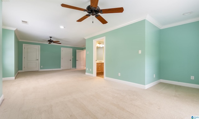 interior space with light colored carpet, ceiling fan, and crown molding