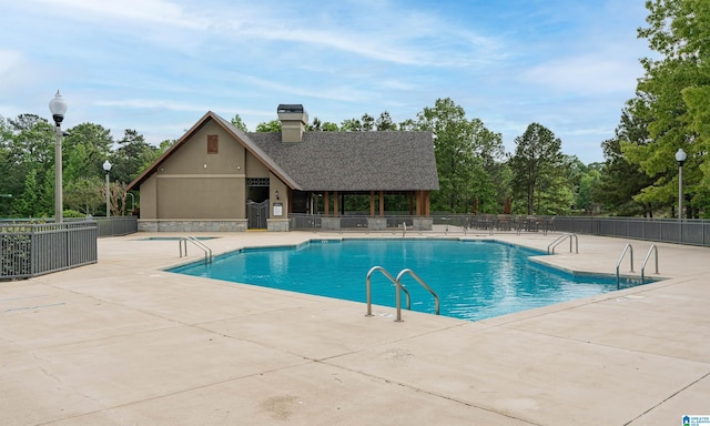 view of pool featuring a patio