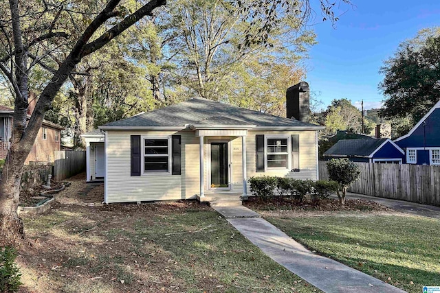 bungalow with a front lawn