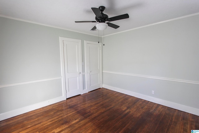 unfurnished bedroom featuring ceiling fan, crown molding, and dark hardwood / wood-style floors